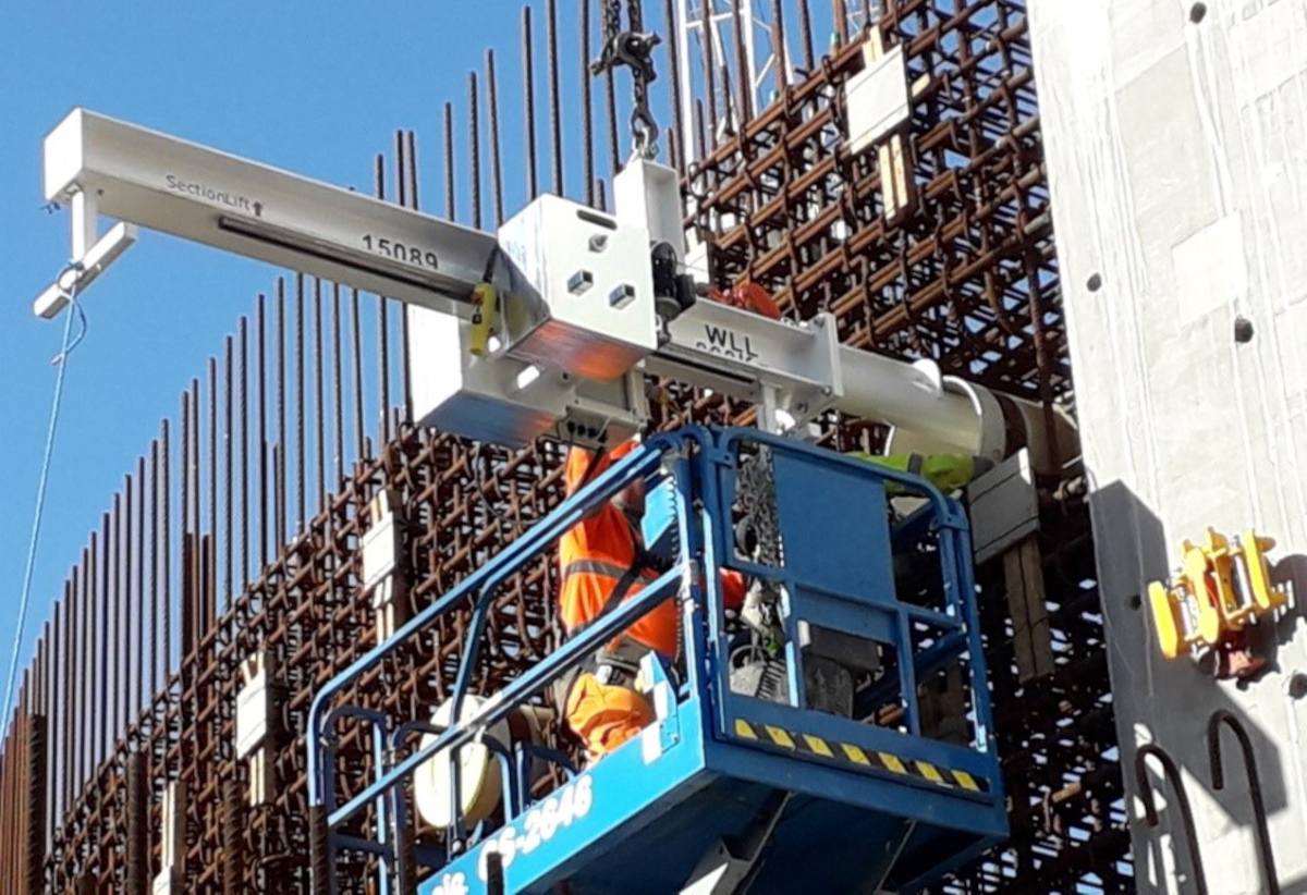 Special Design Electric Counter Balance Lifting Beam Working At Hinckley Point Nuclear Power Station Fitting Steel Conduits Into The Reactor Wall.